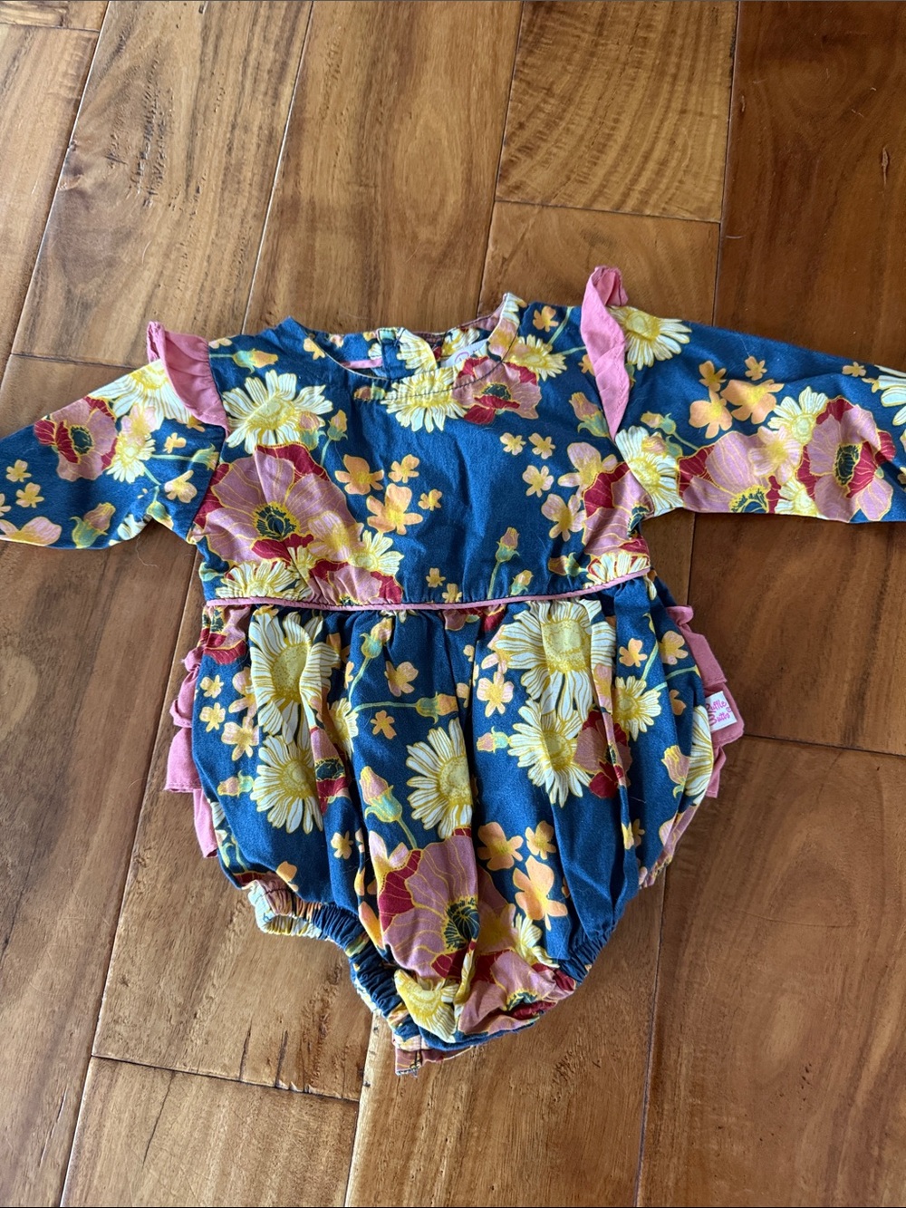 Ruffle Butts Navy Floral Bubble Romper with Pink Accents